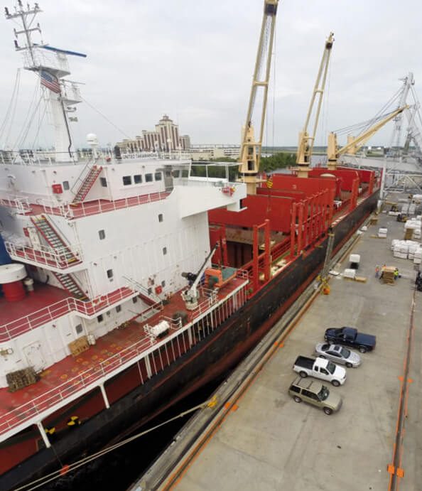 Lumber arrives at City Docks in Lake Charles, Louisiana